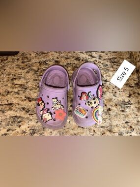 Purple crocs with charms